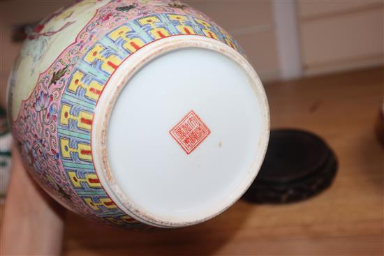 A Chinese famille rose lidded jar and stand height 26cm excluding stand